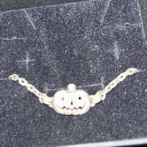 Uneven Jack o’lantern bracelet never worn